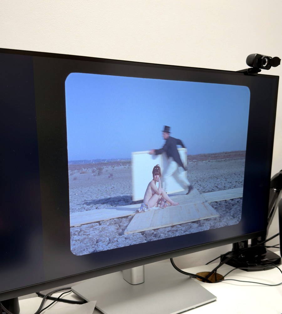 A monitor showing the freshly scanned frame during the process